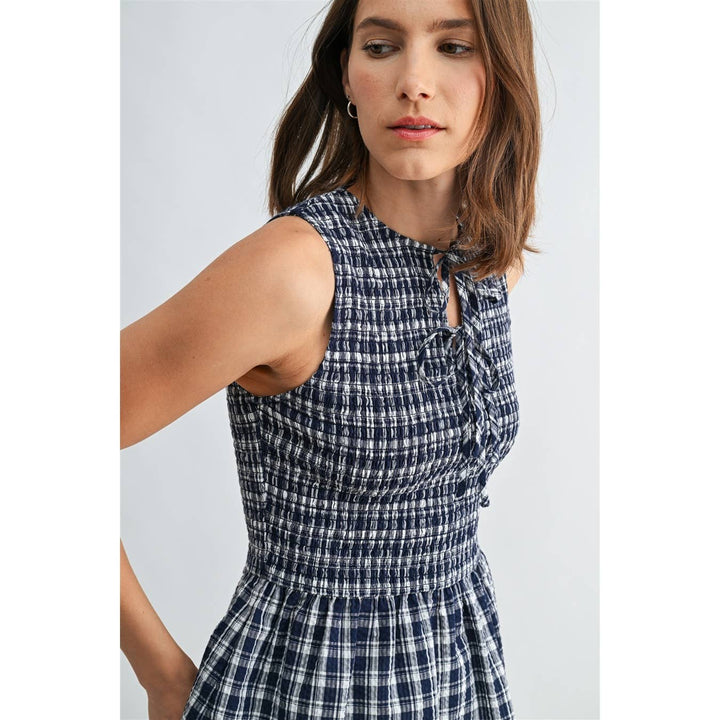Gingham Sleeveless Peplum Tie Detail Smocked Top in Navy